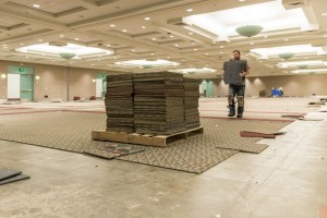Carpet Square removal with worker and stack Wide